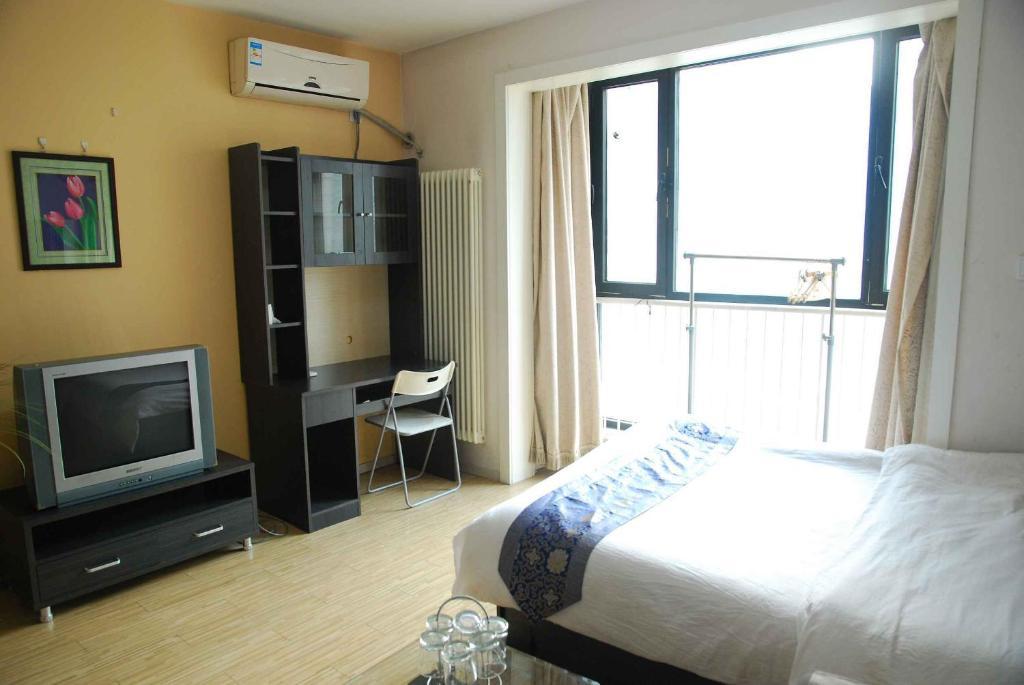 Sun Service Apartment - Birdnest Branch Beijing Værelse billede